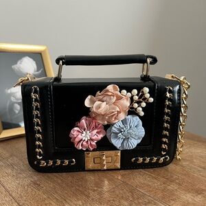 Black Mini Bag with Floral Accents and Gold Chain